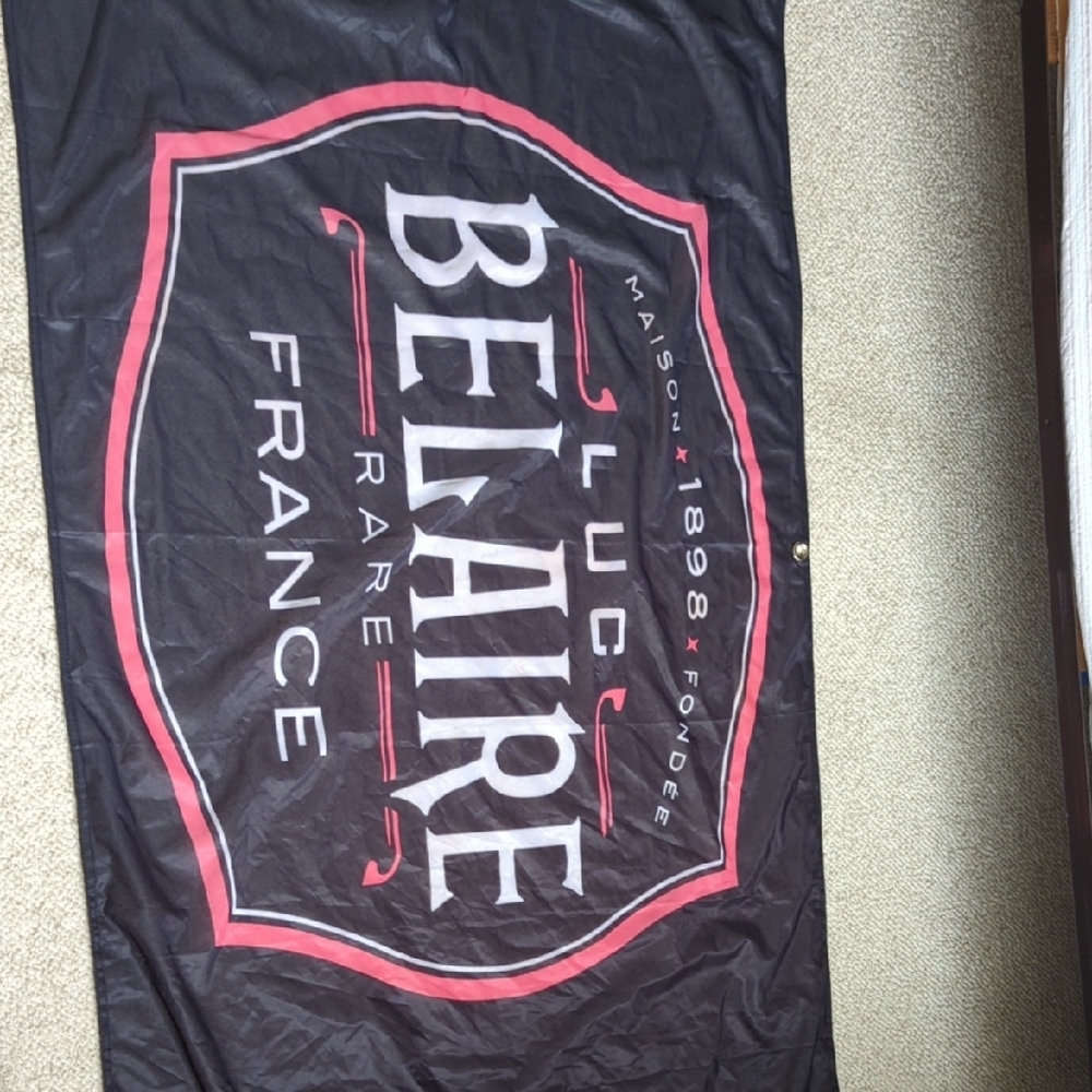 Luc Belaire Black and Red Banner